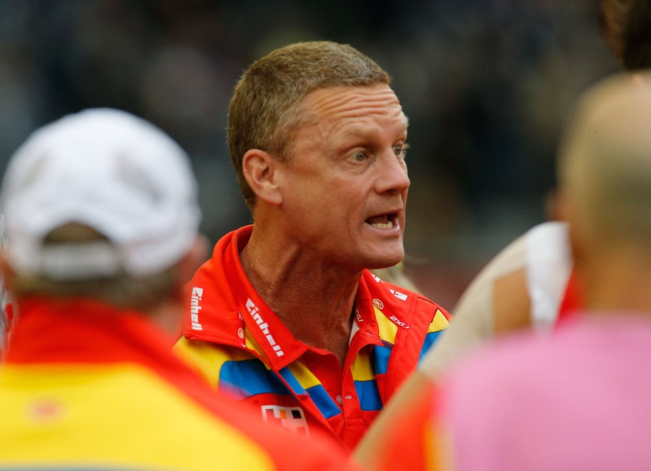 AFL 2014 Rd 20 - Carlton v Gold Coast Gold Coast Suns coach Guy McKenna addresses his players during the 2014 AFL Round 20 match between the Carlton Blues and the Gold Coast Suns at Etihad Stadium, Melbourne on August 09, 2014. (Photo: Greg Ford/AFL Media)